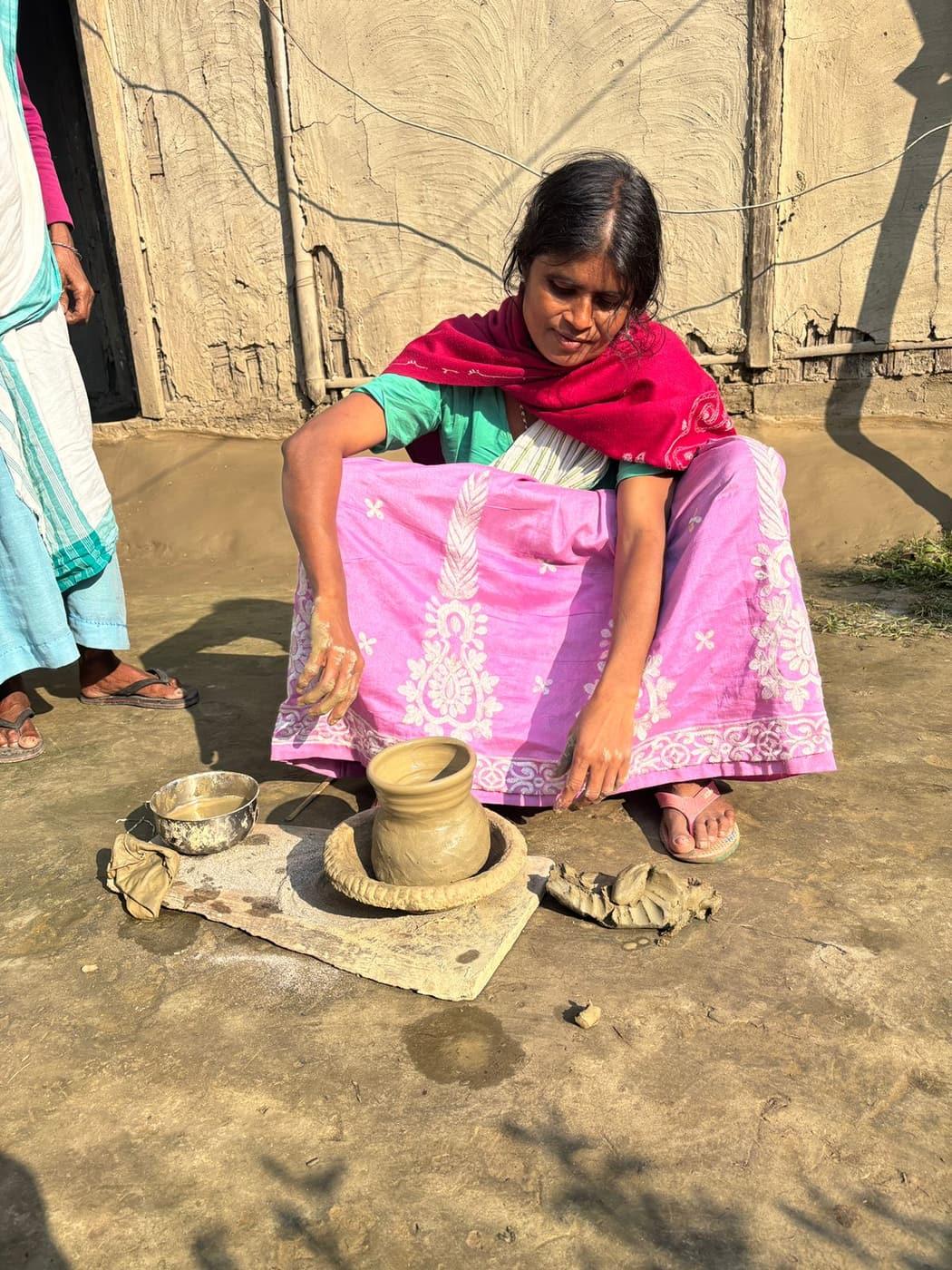 Salmora. No wheel - the pot is turned with the feet while the hands do the real work.