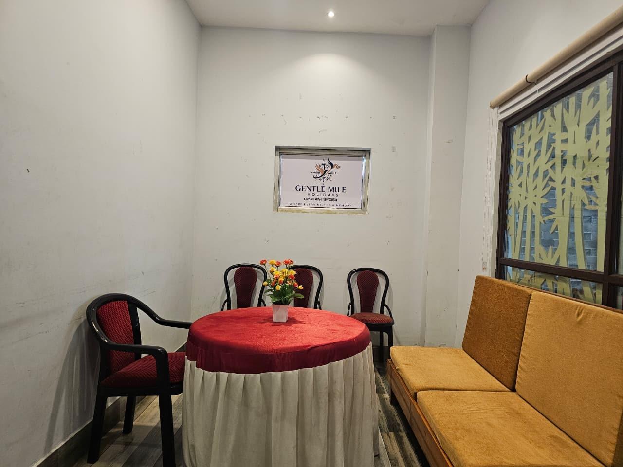 The meeting room at the Gentle Mile Holidays office, with a round table and chairs